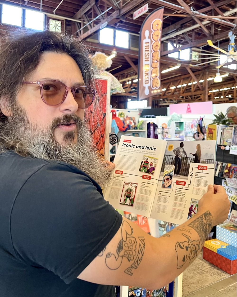 Nick Marino holds his Wonder Man article in Den of Geek Magazine